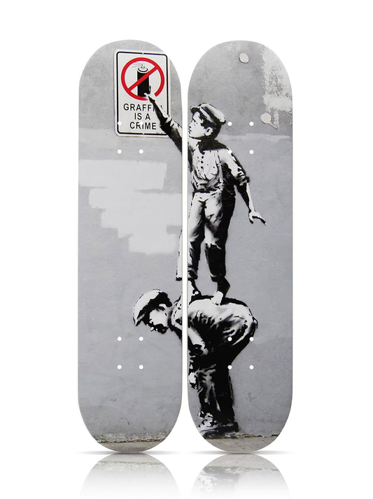 BANKSY (after) 'Graffiti is a Crime' (2019) Diptych Skateboard Deck Set